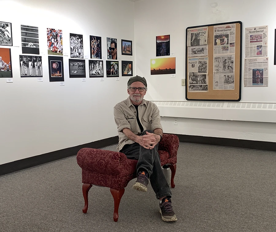 Gerry Pate sitting in gallery at Artists Collective Spartanburg